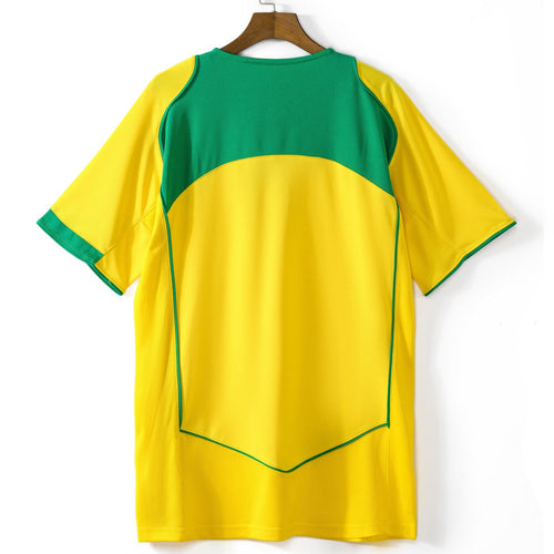 Maillot Brésil domicile rétro 2004, maillot de football Le 12 -ème Maillot, vue de face avec logo et détails colorés.