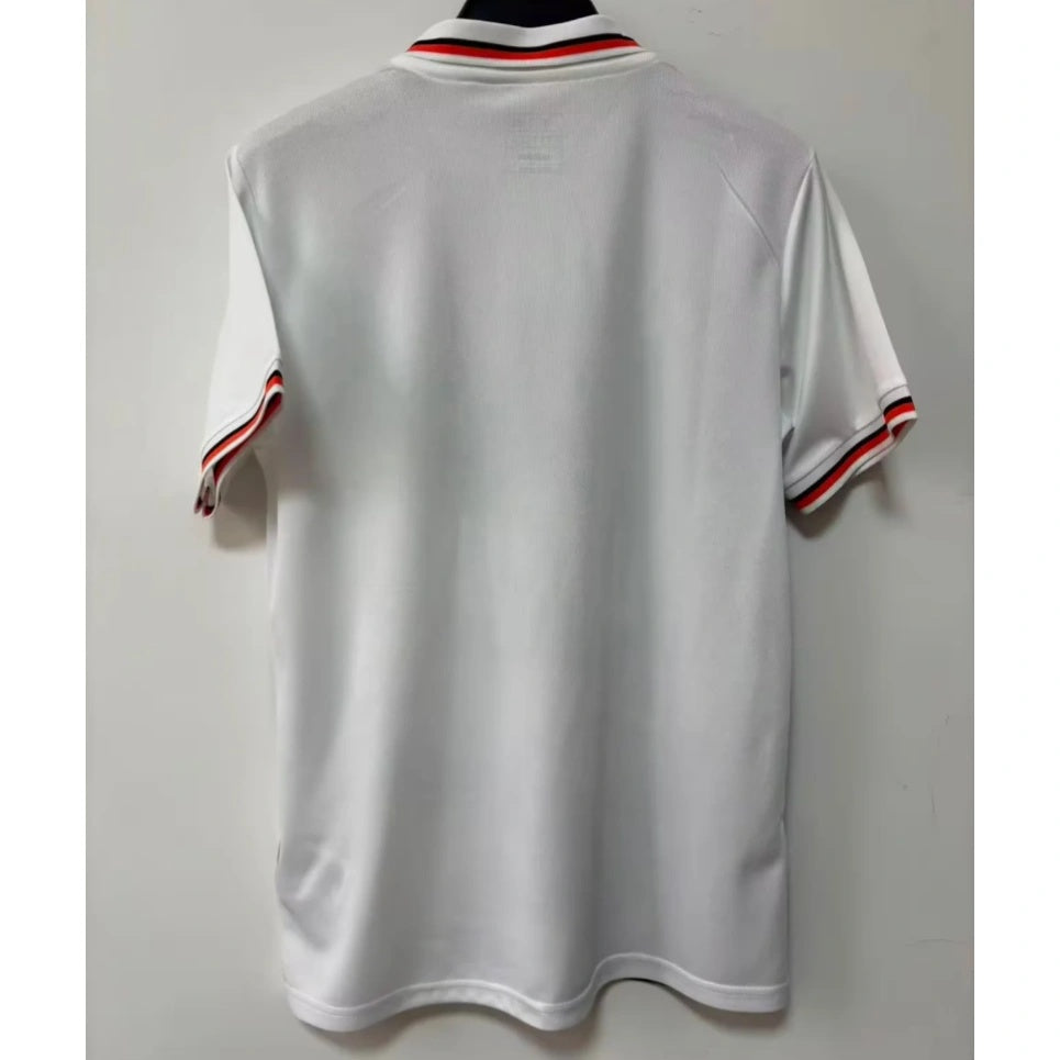 Maillot 25/26 JAPON ANIME Le 12 -ème Maillot, design spécial polo B, vue de face avec motifs japonais colorés.
