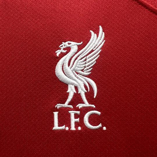 Maillot domicile Liverpool 2023 2024 Le 12 -ème Maillot, maillot de football rouge avec logo et détails officiels.