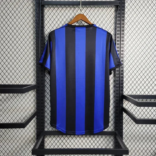 Maillot rétro Inter Milan 1999-2000 de la marque Le 12, avec logo et couleurs classiques, vue de face.