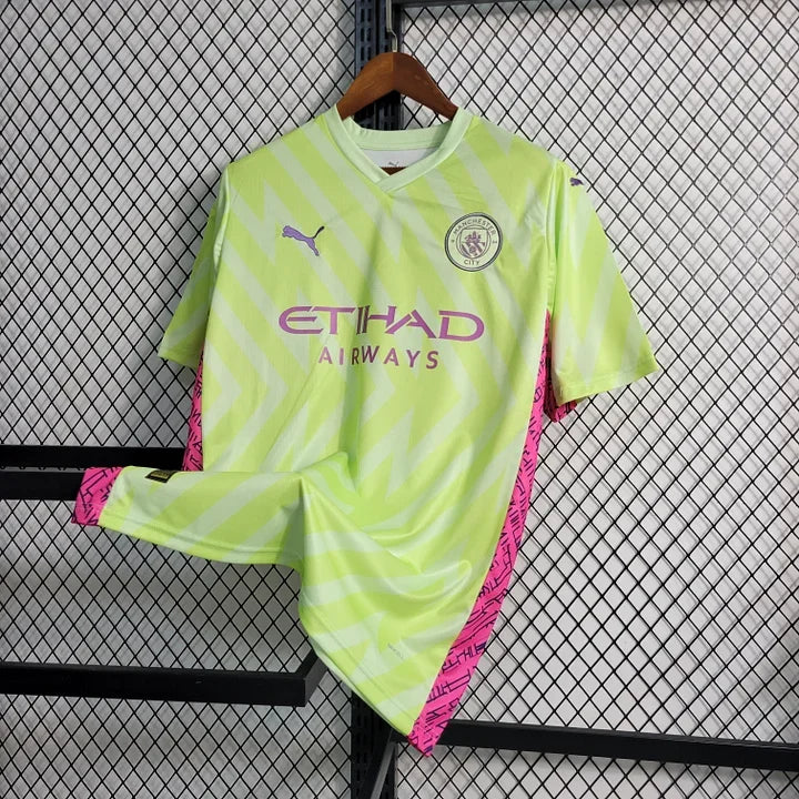 Maillot de gardien Manchester City 2023 2024 Le 12-ème Maillot, maillot de football avec logo et détails en bleu.