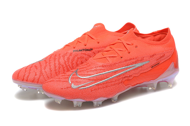 Crampons Phantom GX Elite FG de Le 12 -ème Maillot, fixations en acier, adaptés pour chaussures de football, visibles sur l'image