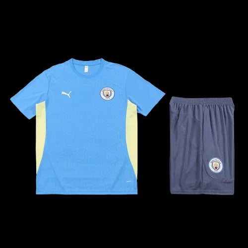 Ensemble Manchester City Le 12 -ème Maillot, maillot de football bleu avec logo de l'équipe, vue frontale sur fond blanc.