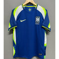 Maillot extérieur de football Corée du Sud Le 12, maillot 25/26, design en bleu avec logos de l'équipe nationale.