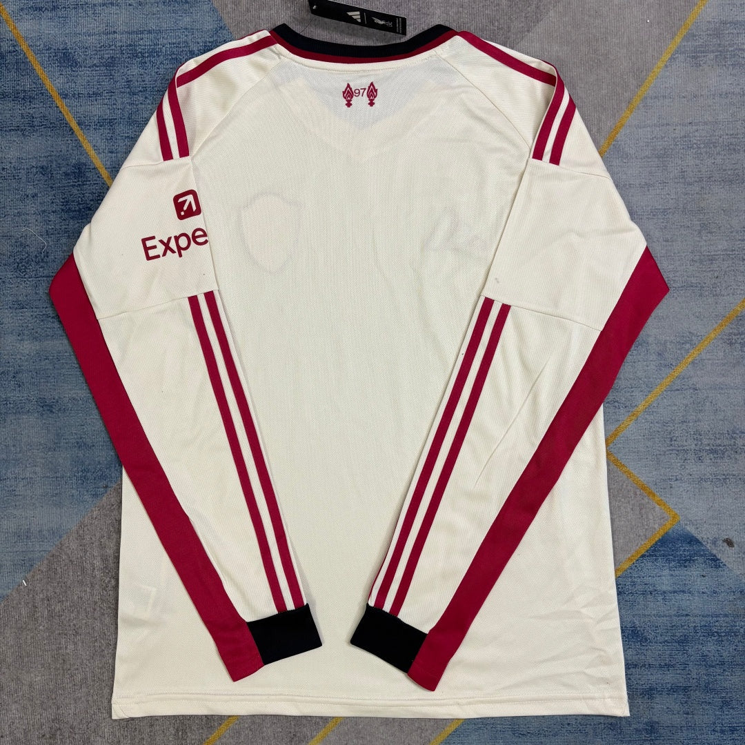 Maillot extérieur Liverpool à manches longues, modèle Le 12 -ème, bleu avec logo officiel sur le devant.