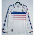 Maillot extérieur rétro de 1998 de l'équipe de France, manches longues, par Le 12 -ème Maillot, violet avec logo national.