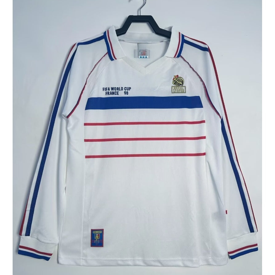 Maillot extérieur rétro de 1998 de l'équipe de France, manches longues, par Le 12 -ème Maillot, violet avec logo national.