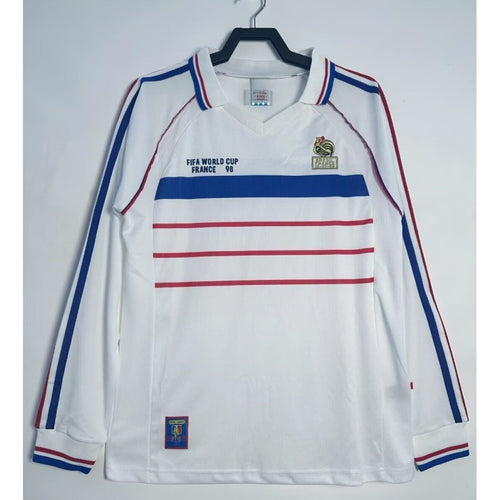 Maillot extérieur rétro de 1998 de l'équipe de France, manches longues, par Le 12 -ème Maillot, violet avec logo national.