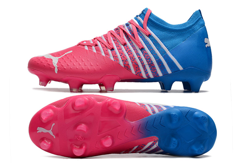 Crampons Future Z 1.3 Teazer FG de Le 12 -ème Maillot, pointes en acier pour football en extérieur, fixation solide, design noir.