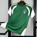 Maillot de football Italie 25/26 Spécial vert, marque Le 12 -ème Maillot, vue de face sur fond blanc.
