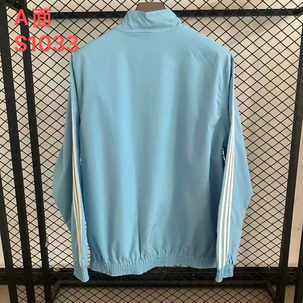 Veste coupe-vent réversible Argentine Le 12 -ème Maillot, tissu léger, design coloré, portée sur mannequin.