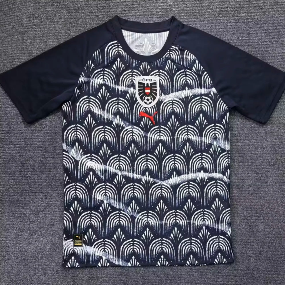 Maillot extérieur 25/26 de l'équipe d'Autriche, marque Le 12 -ème Maillot, affichant les couleurs et le logo de l'équipe nationale.