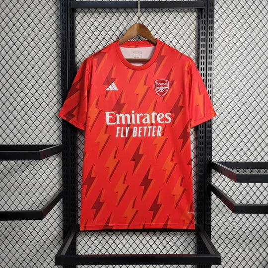 Maillot d'entraînement Arsenal 2023-2024 Le 12 -ème Maillot, vue de face avec logo et détails sur le tissu.