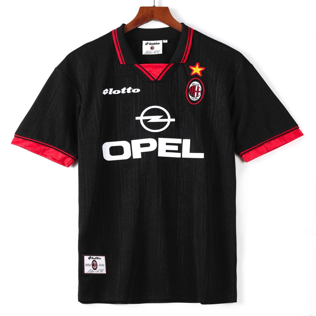 Maillot rétro 1997-1998 AC Milan troisième, marque Le 12-ème Maillot, vue de face avec logo et détails du design orange et noir