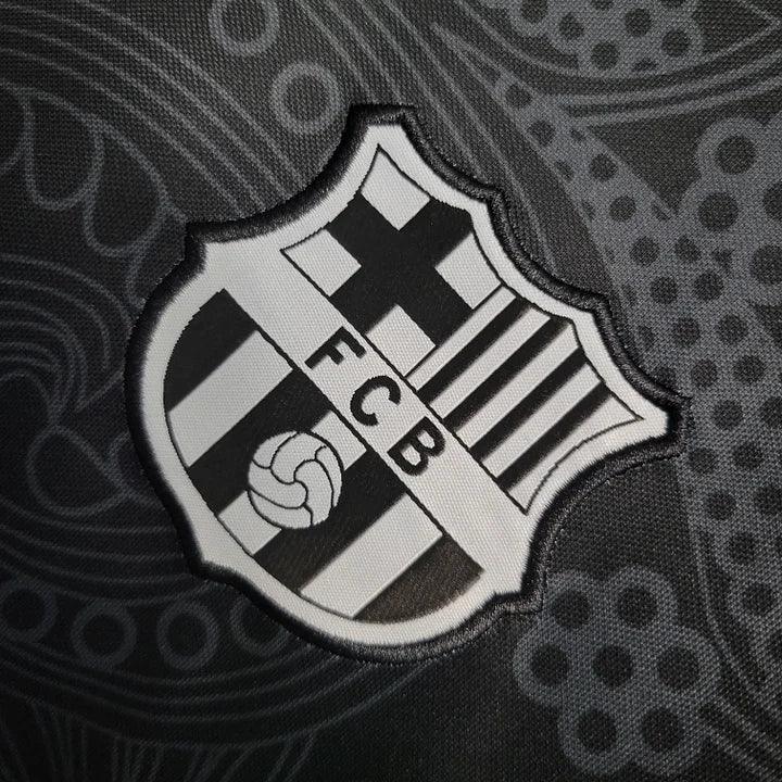 Maillot FC Barcelone saison 2023-2024 édition spéciale, marque Le 12, devant du maillot avec logo et design distinctif