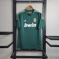 Maillot rétro du Real Madrid 2012-2013 de la marque Le 12-ème, vue de face avec logo et détails historiques.