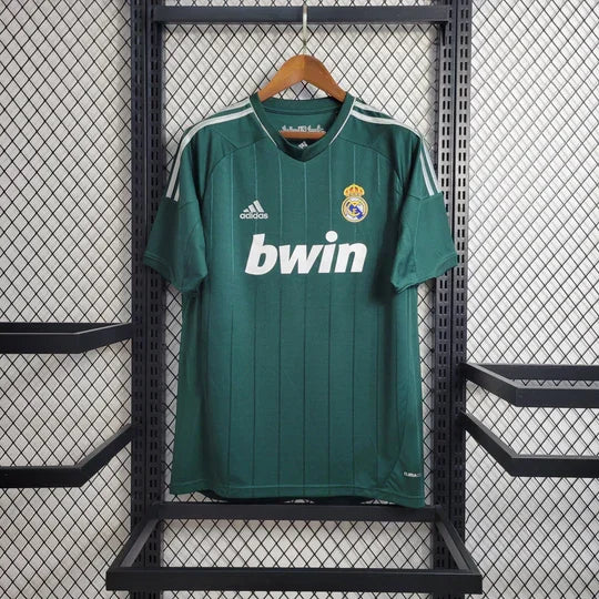 Maillot rétro du Real Madrid 2012-2013 de la marque Le 12-ème, vue de face avec logo et détails historiques.