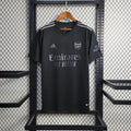 Maillot de football Arsenal 2023 2024 noir, marque Le 12 -ème Maillot, vue de face avec logo et détails du maillot.