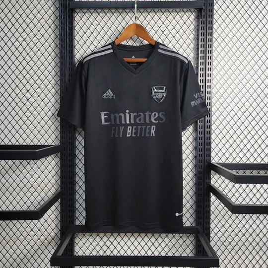 Maillot de football Arsenal 2023 2024 noir, marque Le 12 -ème Maillot, vue de face avec logo et détails du maillot.
