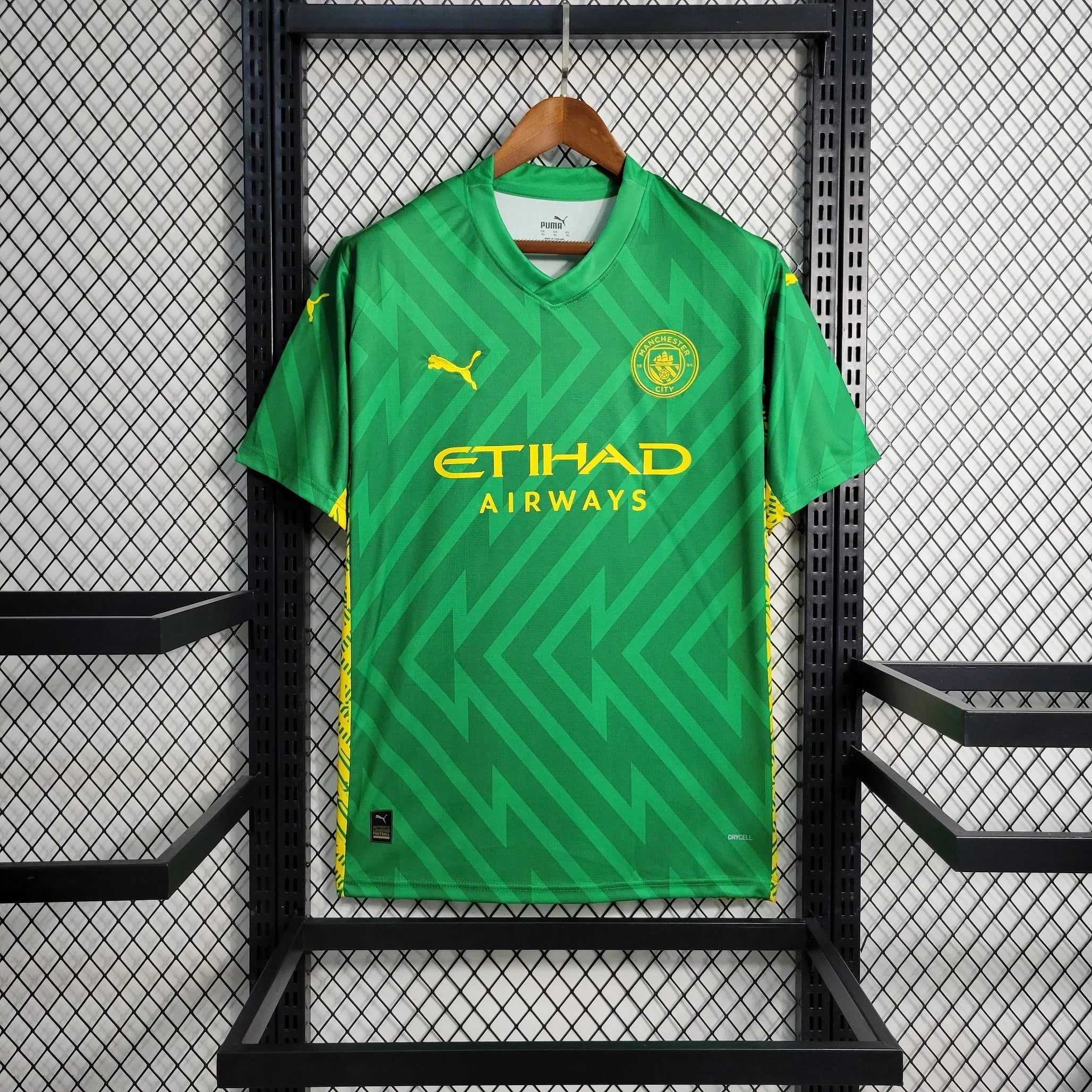 Maillot de gardien Manchester City 2023-2024 Le 12 -ème Maillot, tissu bleu avec logo et détails en blanc.