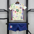 Kit enfant FC Barcelone concept 2025-26 de Le 12 -ème Maillot, maillot bleu et grenat avec logo du club.