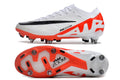 Crampons Mercurial Vapor XV Elite de Le 12 -ème Maillot, vue des crampons en acier avec pointes pour le football.