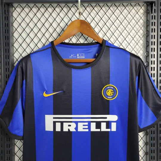 Maillot rétro Inter Milan 1999-2000 de la marque Le 12, vue de face avec logo et détails du design classique.
