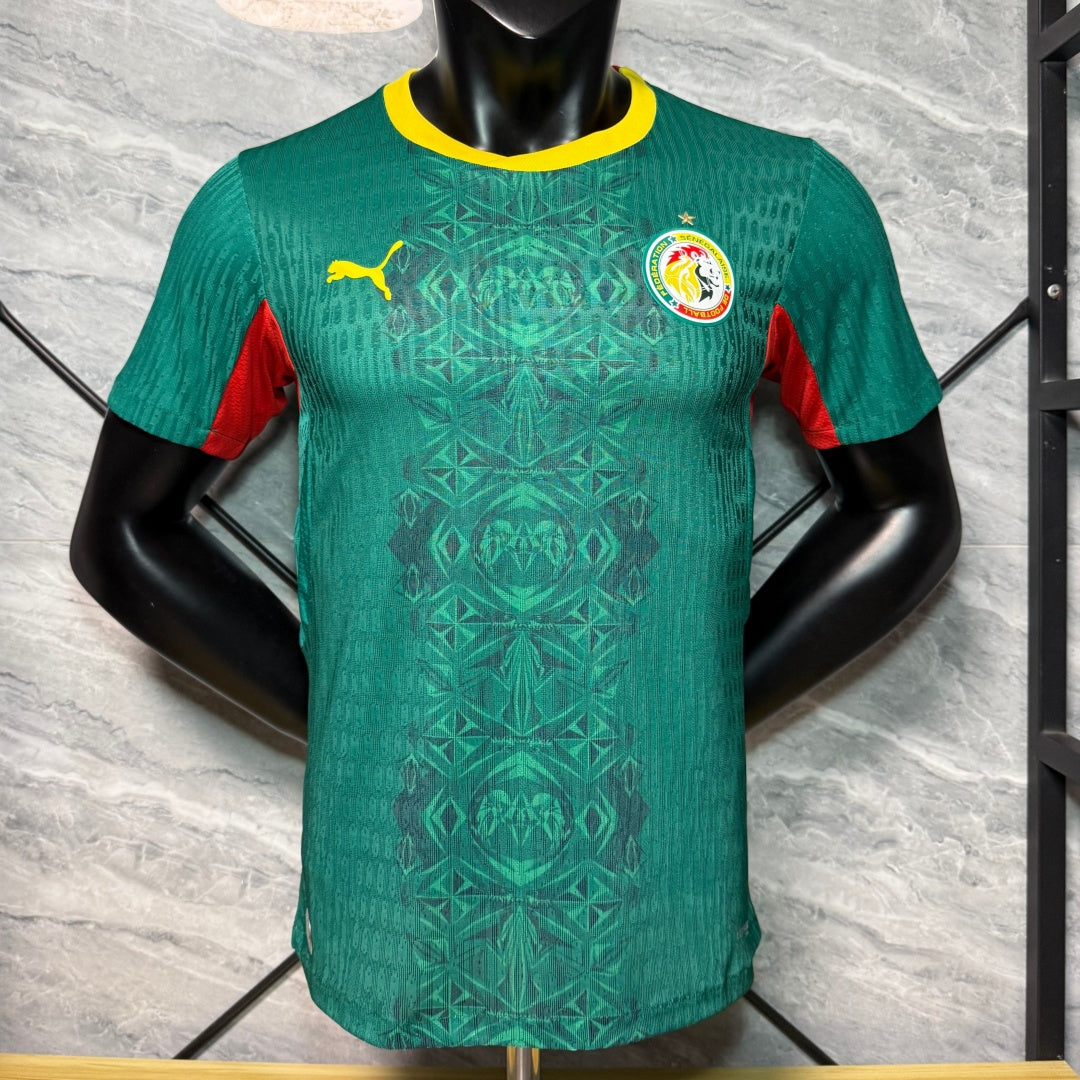 Maillot vert 25/26 du Sénégal de l'équipe Le 12-ème Maillot, vue de face avec logo et détails du maillot.
