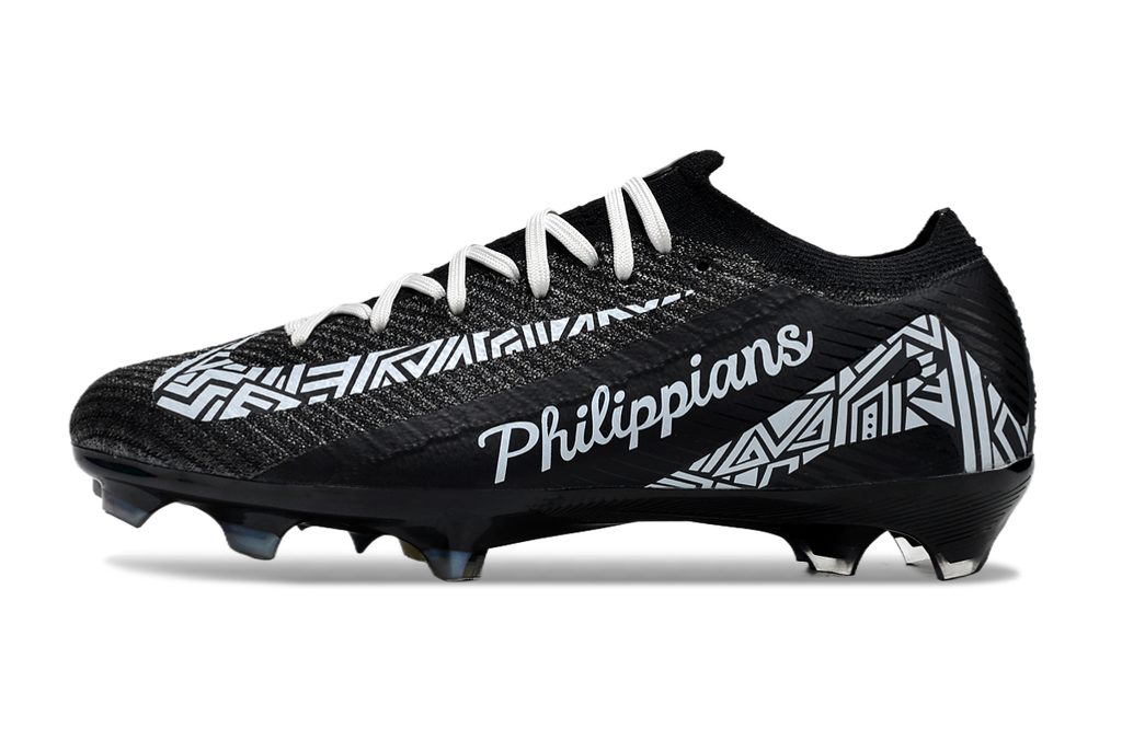 Crampons Mercurial Vapor 16 Elite XXV pour football, semelles en métal avec pointes pour adhérence.