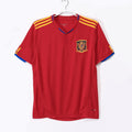 Maillot domicile rétro 2010 de l'équipe d'Espagne, marque Le 12 -ème Maillot, affichant les couleurs traditionnelles de la sélection espagnole.