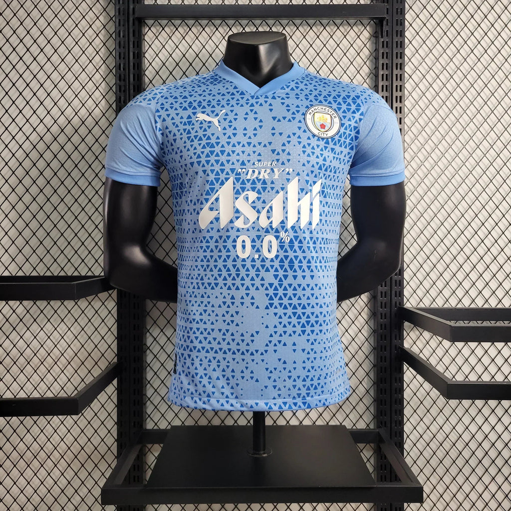 Maillot Manchester City 2023 2024 Le 12 -ème Maillot, maillot de football avec logo de Manchester City, vêtements de sport bleu.