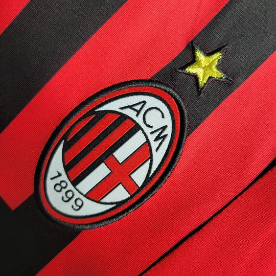 Maillot rétro AC Milan 2007-2008 de la marque Le 12-ème, vue de face avec logo et détails du design classique.