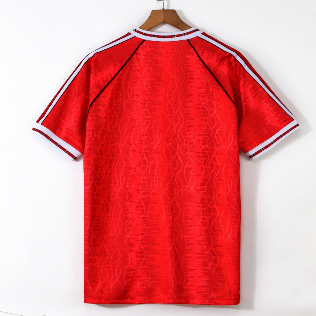 Maillot domicile Manchester United 1991-1992 rétro, marque Le 12 -ème Maillot, vue de face avec détails du design vintage.
