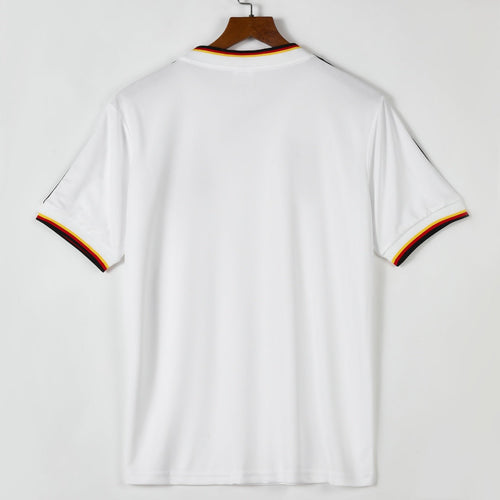 Maillot domicile rétro 1986 Allemagne, marque Le 12 -ème Maillot, vue de face avec détails du design.