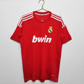 Maillot rétro third de Real Madrid 2011-2012, marque Le 12-ème Maillot, vue de face avec logo et détails du maillot.
