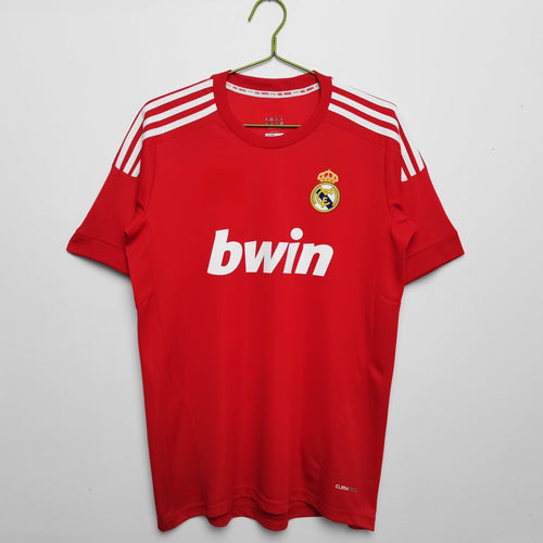 Maillot rétro third de Real Madrid 2011-2012, marque Le 12-ème Maillot, vue de face avec logo et détails du maillot.