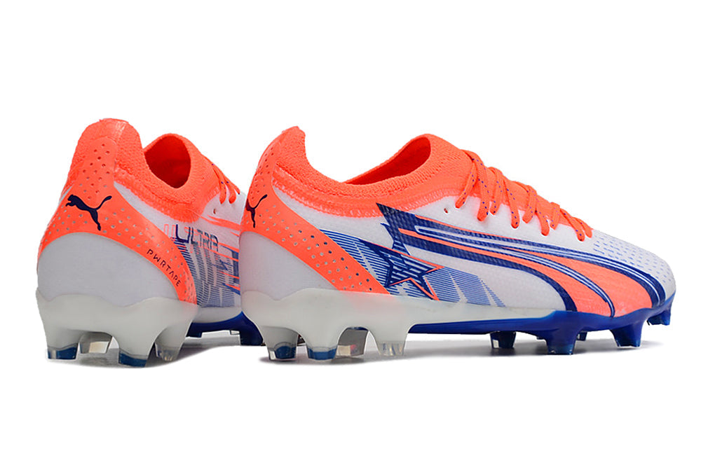 Crampons Ultra Ultimate FG de Le 12 -ème Maillot, crampons de football avec semelles en caoutchouc et pointes métalliques pour terrain ferme.