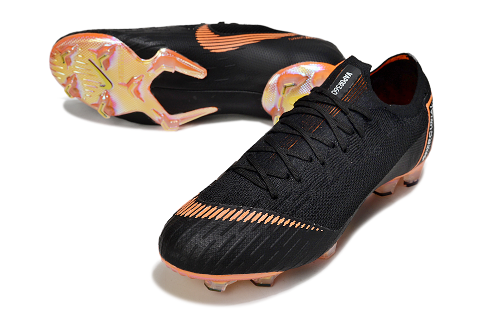 Crampons Mercurial Vapor XII Elite de Le 12 -ème Maillot, vue détaillée avec crampons en métal pour football ou sports extérieurs.