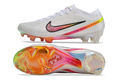 Crampoons Mercurial Vapor 15 Elite XXV FG de la marque Le 12 -ème Maillot, montrant les crampons en caoutchouc et la semelle.