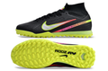 Crampons Mercurial Superfly IX Elite pour football, montrant la semelle avec crampons en métal et design noir et orange.