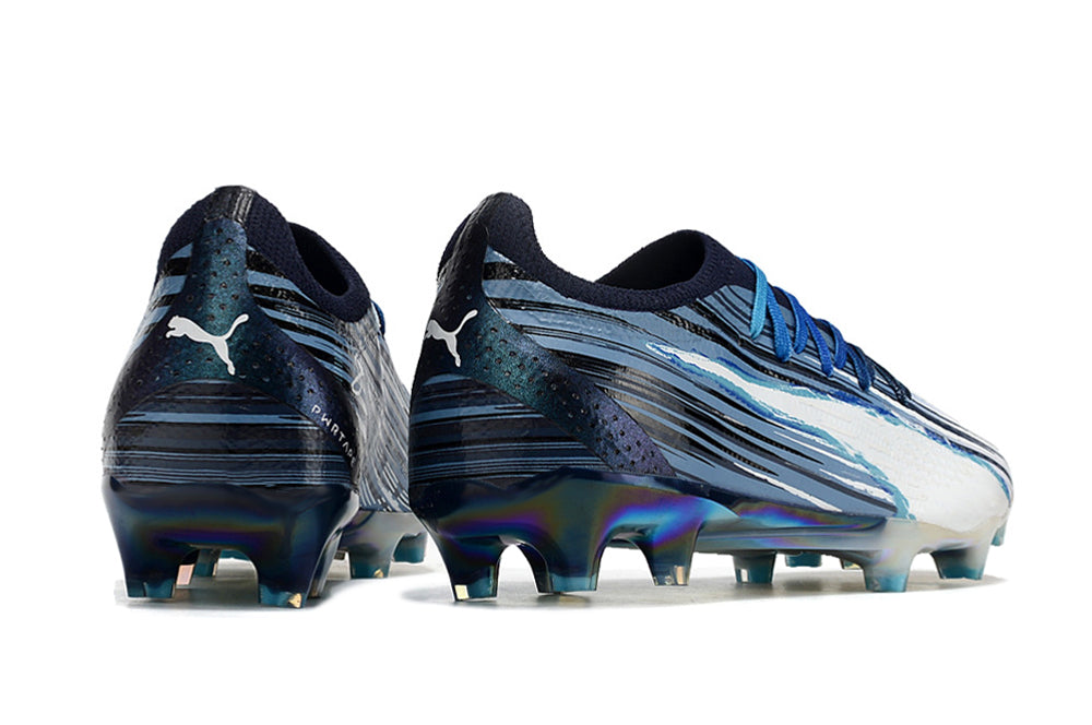 Crampons Ultra Ultimate FG de Le 12 -ème Maillot, fixation robuste pour chaussures de football, visibles sur l'image.