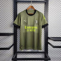 Maillot third de l'AC Milan 2022/2023, maillot de football noir et rouge de la marque Le 12 -ème Maillot, vue de face.