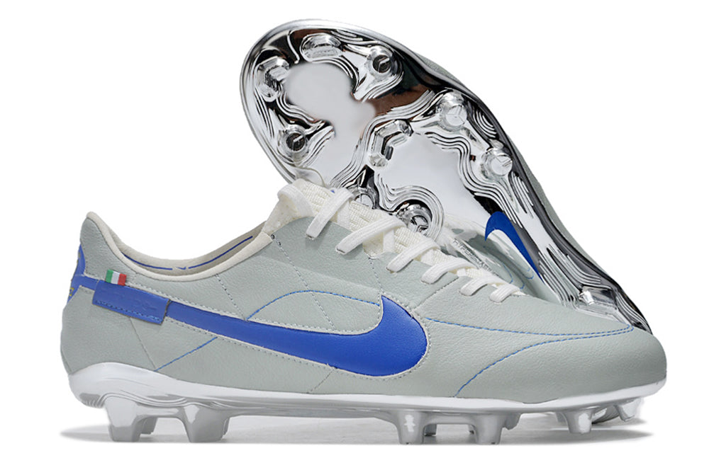 Crampons Le 12 -ème Maillot Tiempo Legend 9 Elite pour football, vue des crampons avec semelles en acier et attaches ajustables