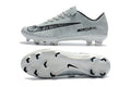 Crampons Mercurial Vapor XI pour football, chaussures de sport avec semelles à crampons pour meilleure adhérence.