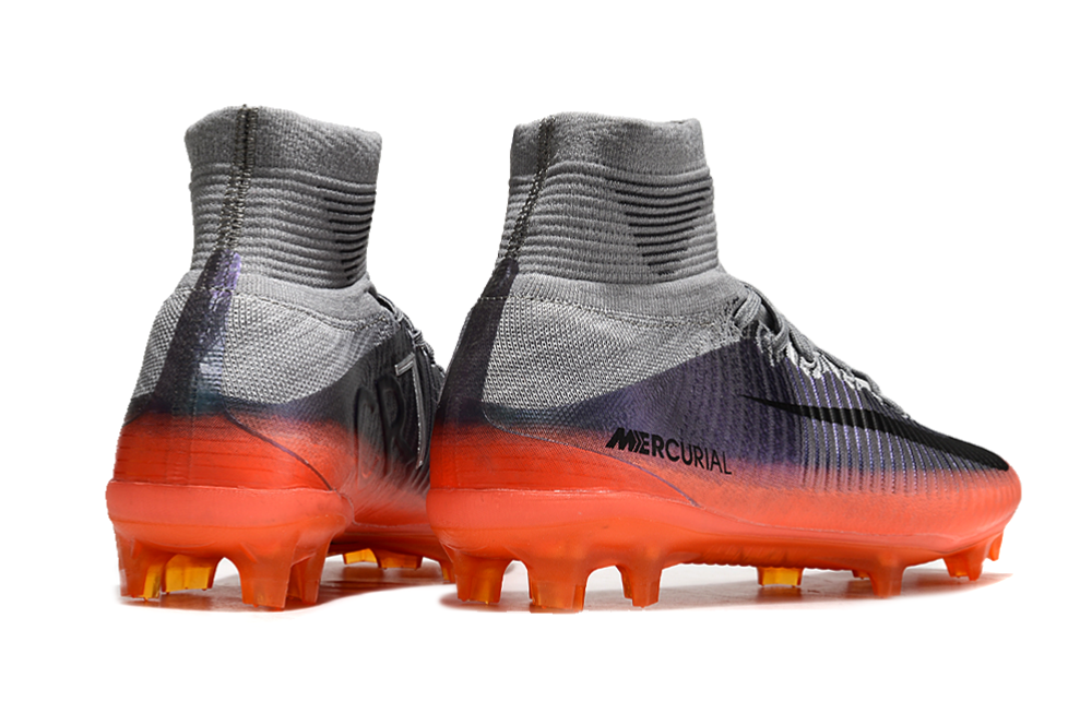 Chaussures de football Mercurial Vapor X avec crampons, vue de profil montrant la semelle et le design Nike.