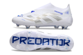 Crampons Predator Accuracy+ FG pour chaussures de montagne, fixation robuste et adhérence améliorée, en acier durable.