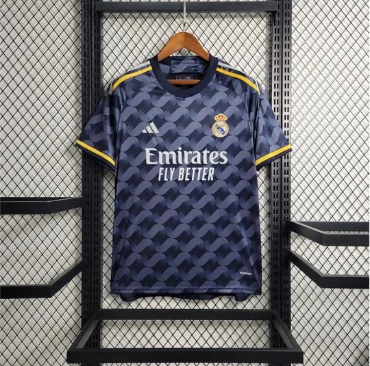 Maillot extérieur Real Madrid saison 2023-2024, marque Le 12-ème Maillot, vue de face avec logo et détails du maillot.