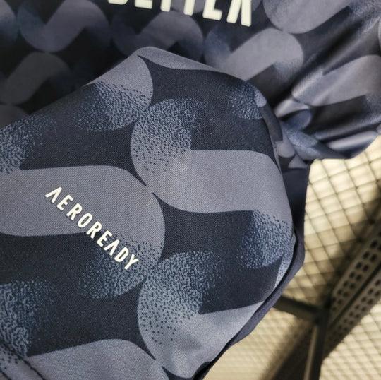 Maillot extérieur du Real Madrid saison 2023-2024, marque Le 12 -ème Maillot, vue de face avec logo et détails du design.