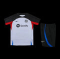 Ensemble Barcelone de Le 12 -ème Maillot, maillot de football bleu avec logo du club, vue de face sur fond blanc.