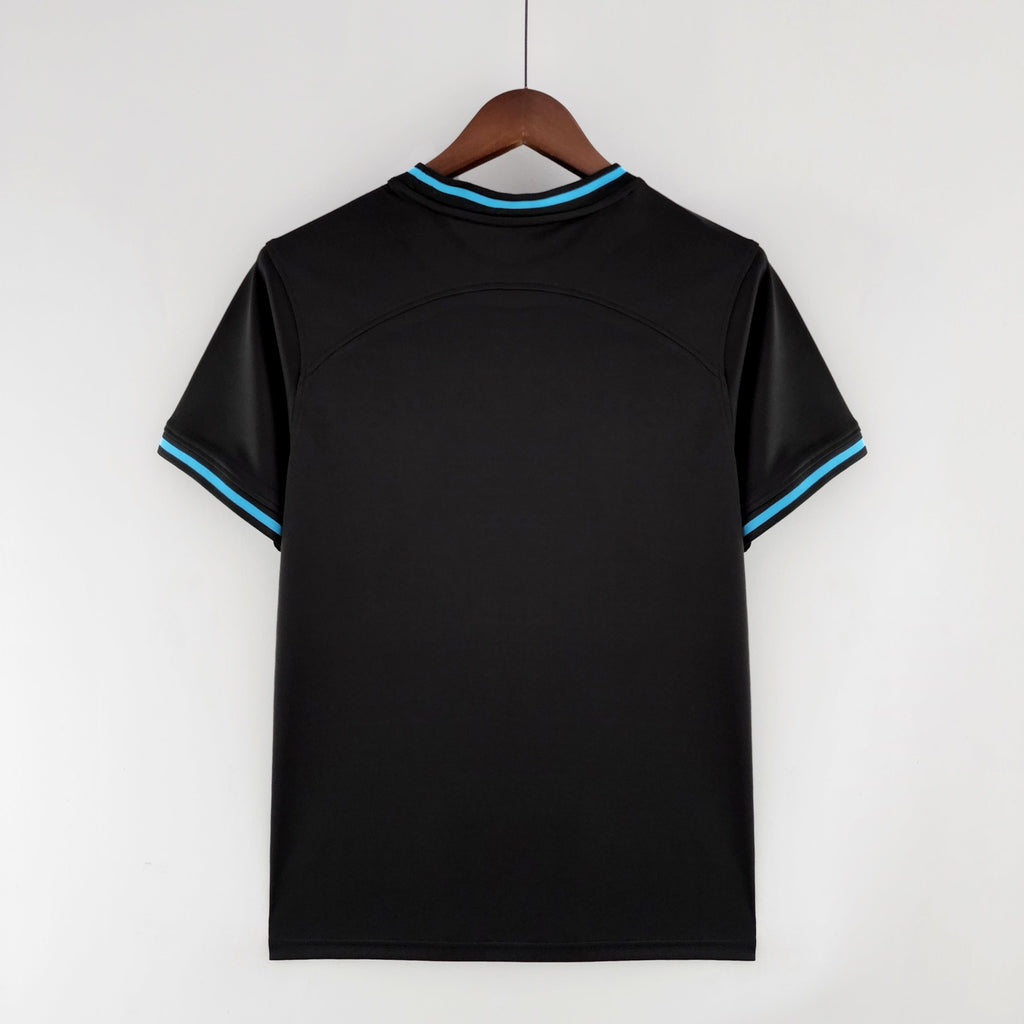 Maillot spécial du Brésil 2022/2023 de l'équipe Le 12, noir, avec détails du design sur le devant.